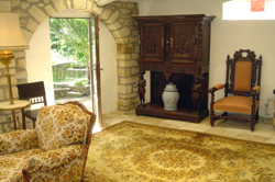 Stone room door to pond garden