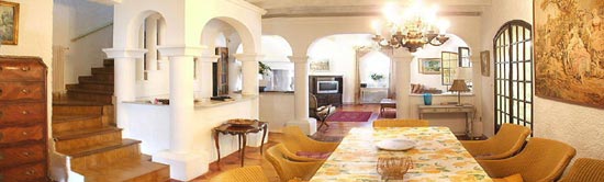 Dining room looking through to round lounge